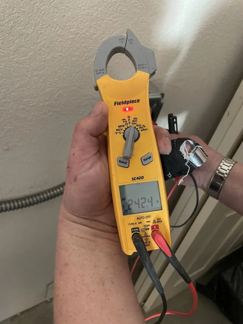 Voltage testing with clamp meter during Generator Installation in Lochsloy